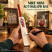 MRF 15 inch mini autograph cricket bat being signed