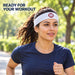 Woman wearing the white SS sports headband during an outdoor run