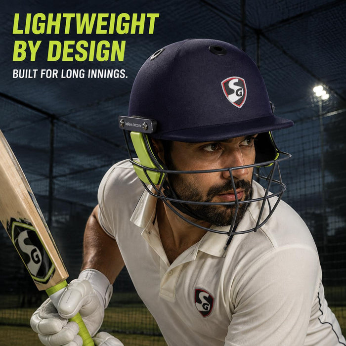 Adult cricketer wearing SG Aeroselect navy blue cricket helmet during play