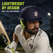 Adult cricketer wearing SG Aeroselect navy blue cricket helmet during play