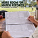 Scorer using the CA 100 Innings Cricket Scorebook at the cricket ground
