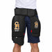 CA Gold Players Edition dual thigh guard front view on a model wearing a white polo and navy sports shorts