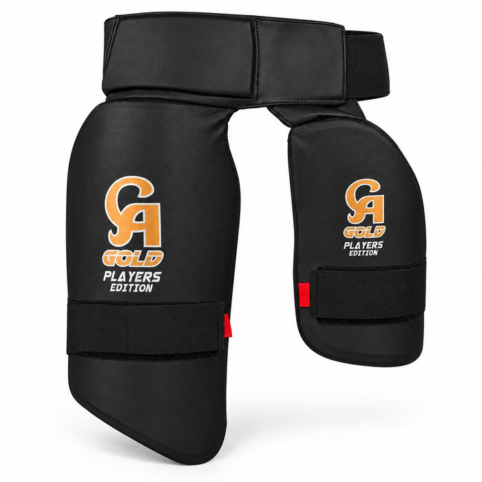 CA Gold Players Edition black dual thigh guard product-only catalog view showing outer pad, inner pad, waistband and straps without a model