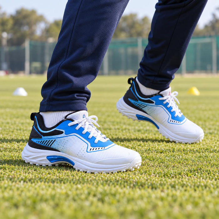 Cricketer wearing CA JR20 Blue cricket shoes during fielding footwork practice