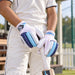 SG Campus junior batting gloves worn while gripping a cricket bat