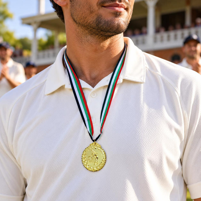 Cricket Arabia gold-colour cricket medal with striped ribbon worn at an award presentation