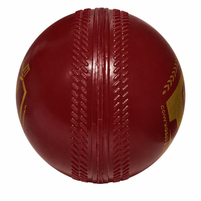 SG Everlast Tec red synthetic cricket ball molded seam close-up