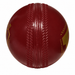 SG Everlast Tec red synthetic cricket ball molded seam close-up