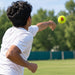 Bowler using a neon yellow CA Speed cricket ball