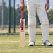 MRF Genius Prince English Willow Cricket Bat - SH held upright by a cricketer before practice