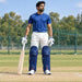 MRF Power 2.0 blue batting leg guards worn by a mens cricketer on a practice pitch