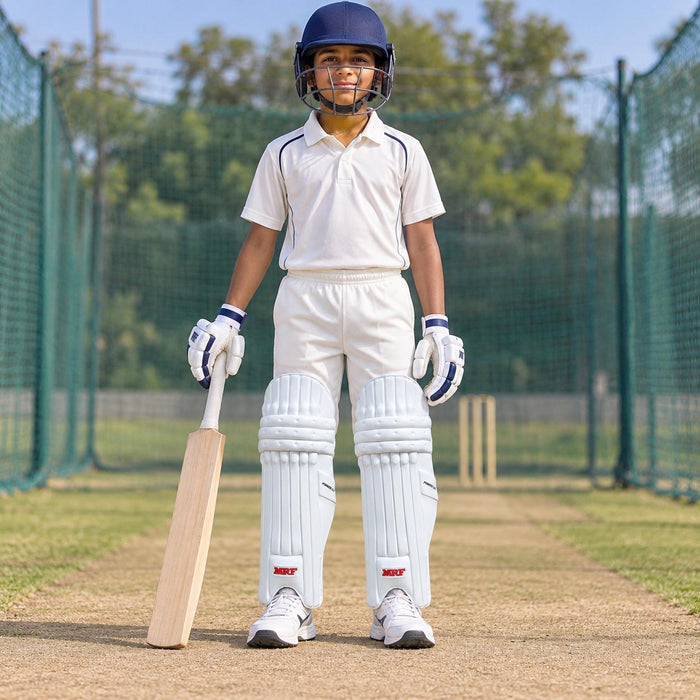 MRF Power 3.0 white batting leg guards worn by a junior cricketer on a practice pitch