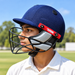 Junior cricketer wearing the blue MRF Prodigy helmet with black grille and red side plates