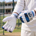 Cricketer using SG E-Lite Batting Gloves - Mens, Youth & Boys - practice lifestyle