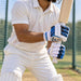 Cricketer using SG E-Lite Batting Gloves - Mens, Youth & Boys - wrist fastening and fit