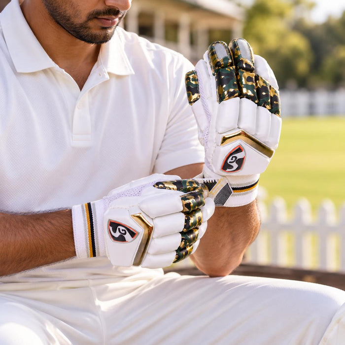 Cricketer adjusting the wrist strap on SG HP Lite cricket batting gloves