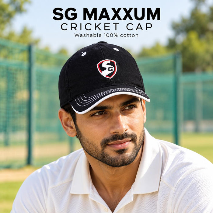 Adult cricketer wearing the SG Maxxum Black Cricket Cap at practice, showing SG shield and white peak stitching