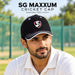 Adult cricketer wearing the SG Maxxum Black Cricket Cap at practice, showing SG shield and white peak stitching