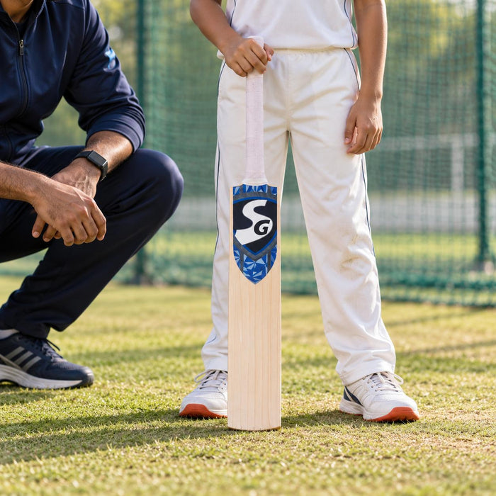 SG RSD Spark Kashmir Willow Cricket Bat Sz 2 held upright by a cricketer before practice