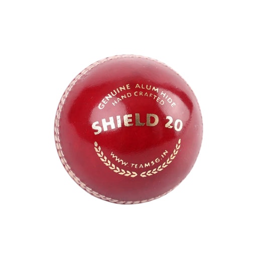 SG Shield 20 red cricket ball showing genuine alum hide and hand-crafted model marking