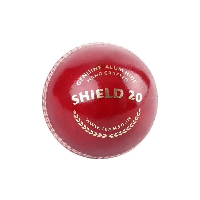 SG Shield 20 red cricket ball showing genuine alum hide and hand-crafted model marking