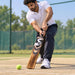 Adult cricketer using the SG T-Flame SH bat during tennis-ball cricket practice