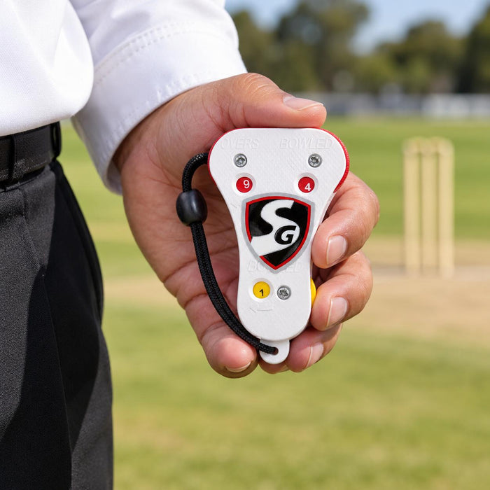 SG white and red umpire counter held during cricket umpiring
