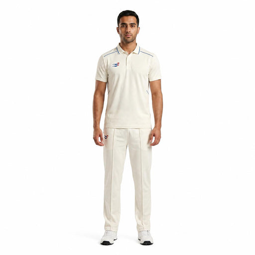 Adult model wearing the Sportiff white short sleeve cricket shirt and matching trousers