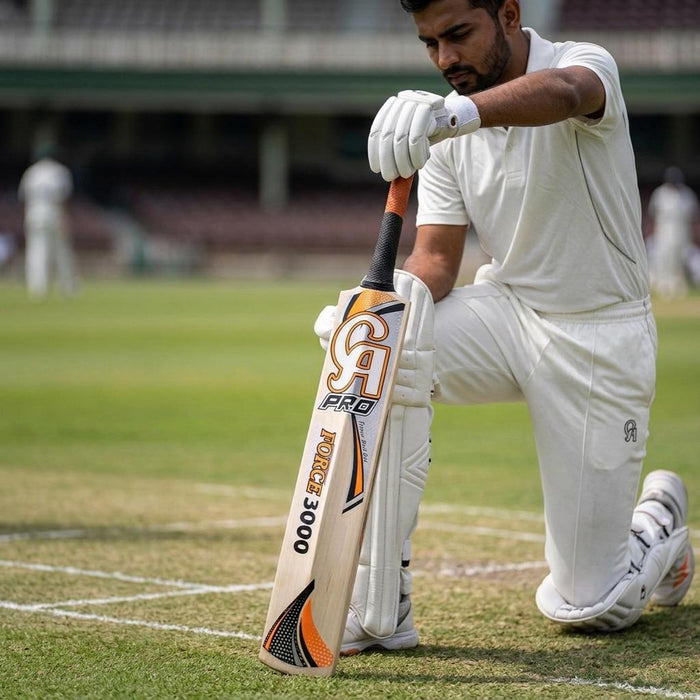 Square cricketer holding CA bat image