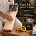 Cricketer polishing a willow bat with SS Bat Wax tin nearby and moisture maintenance benefits