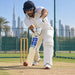 Adult cricketer playing a defensive shot with the SS Sky Stunner Kashmir Willow Short Handle bat in cricket practice nets