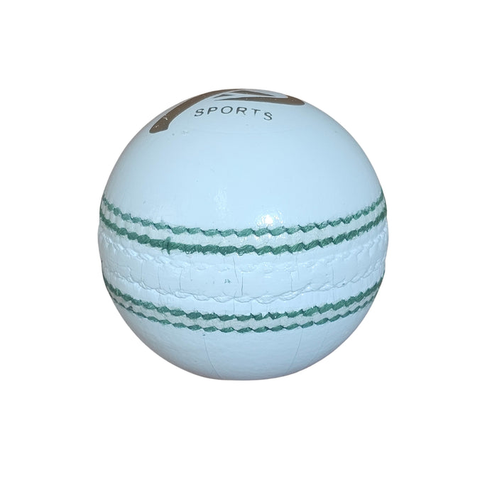 White leather cricket ball side view showing green stitched seam